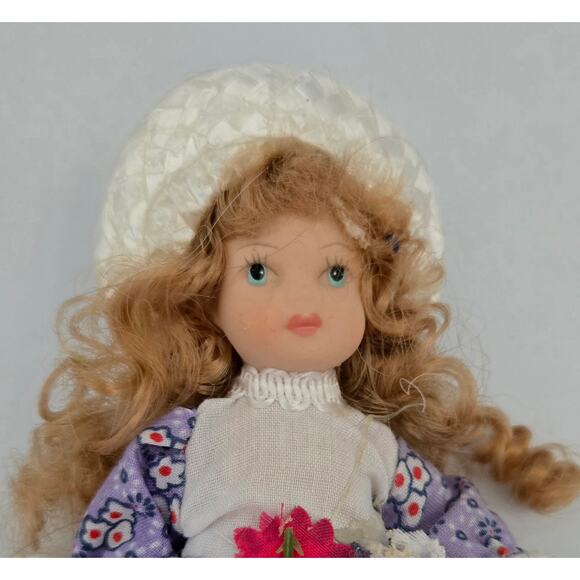 4.5 inch Miniature Doll with a Purple Dress and a White Hat - Picture 2 of 10